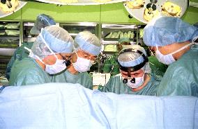 Doctors prepare to transplant liver from brain-dead donor